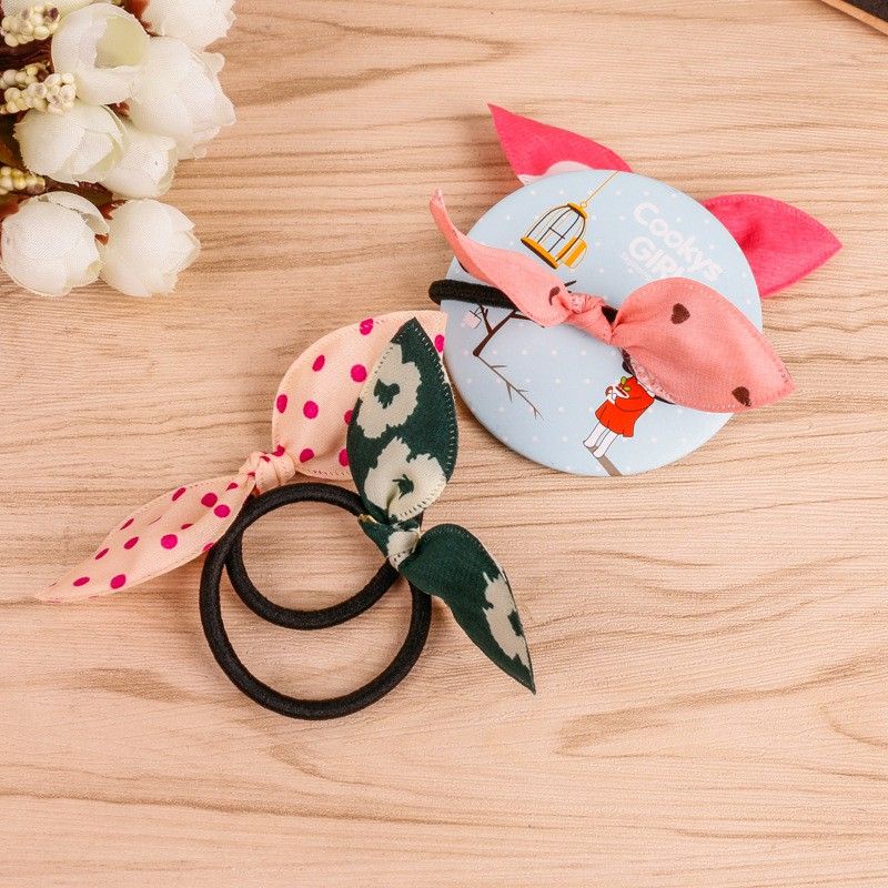 Dây cột tóc nơ hoa xinh xắn