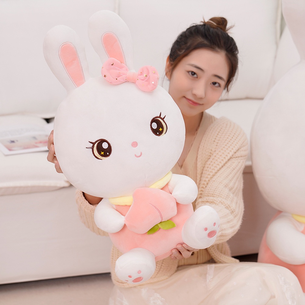 CÓ SẴNGấu bông thỏ trắng ôm đào dễ thương kích thước 40-55cm