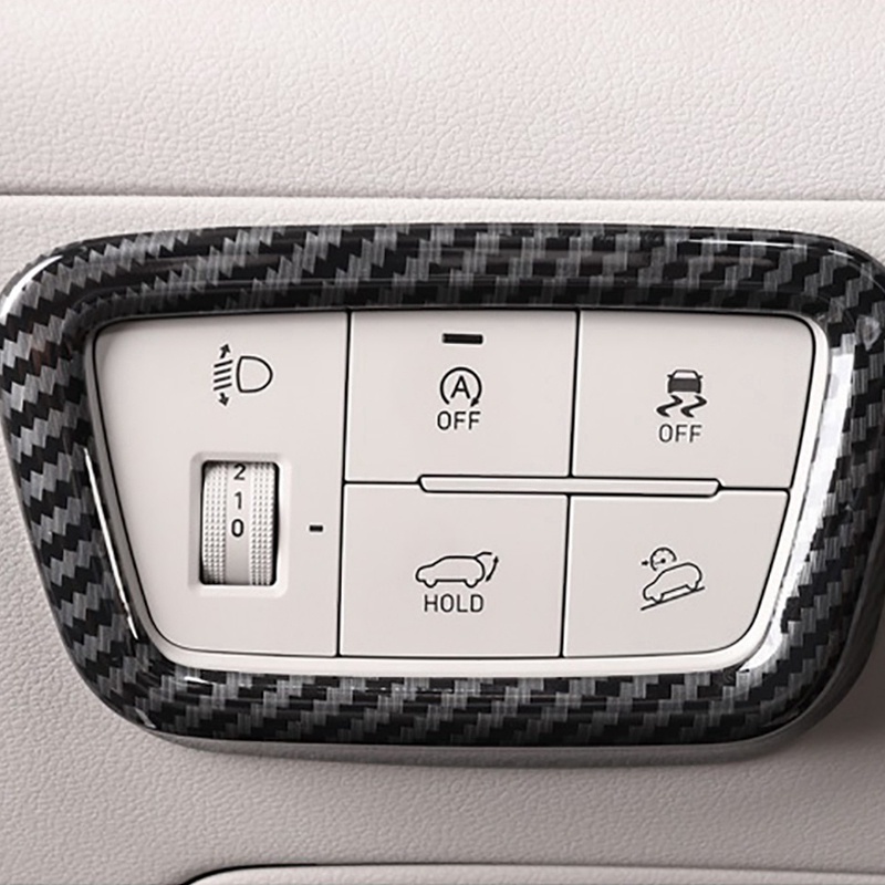 Khung dán công tắc điều chỉnh đèn pha xe hơi Hyundai Tucson 2021 2022 bằng sợi carbon màu đen
