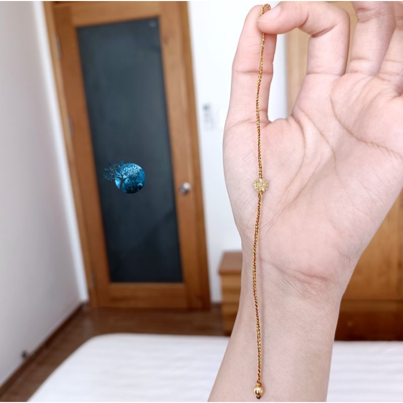 Vòng tay tết dây chỉ ngũ sắc mix hoa đồng tiền vàng kim