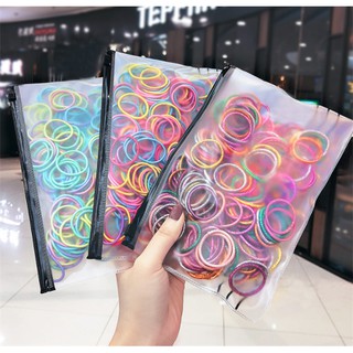 Set 100 chiếc chun buộc tóc trơn nhiều màu kèm túi zip