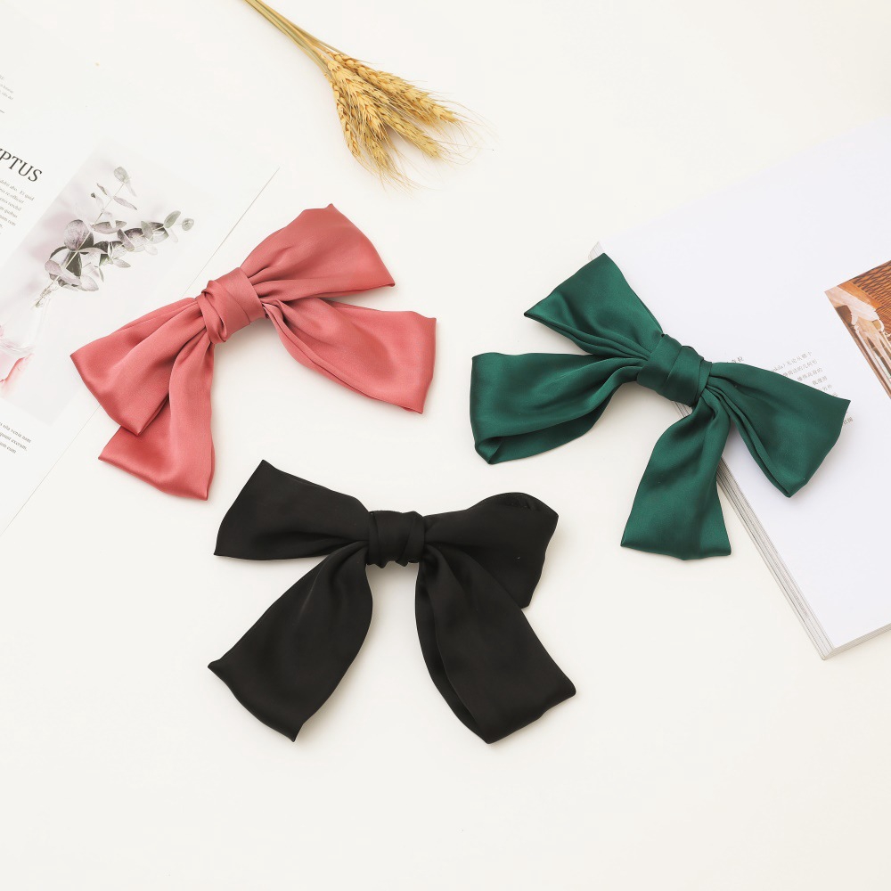 Kẹp tóc thiết kế hình nơ xinh xắn cho nữ