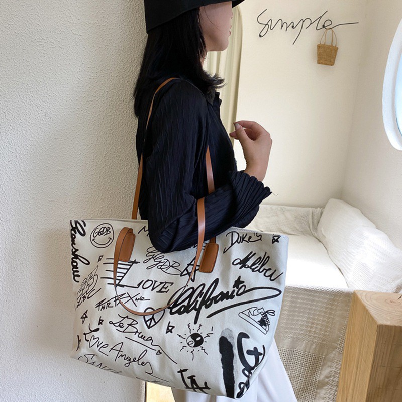 Túi Vải Canvas Đeo Vai Có Khóa Kéo Họa Tiết Graffiti Thời Trang Cho Nữ