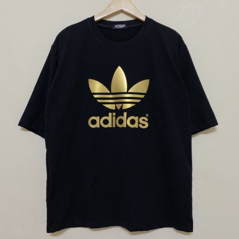 Áo thun % Hình thật B'teen ép nhủ vàng