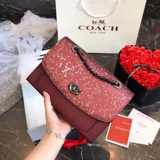 Túi đeo chéo Coach