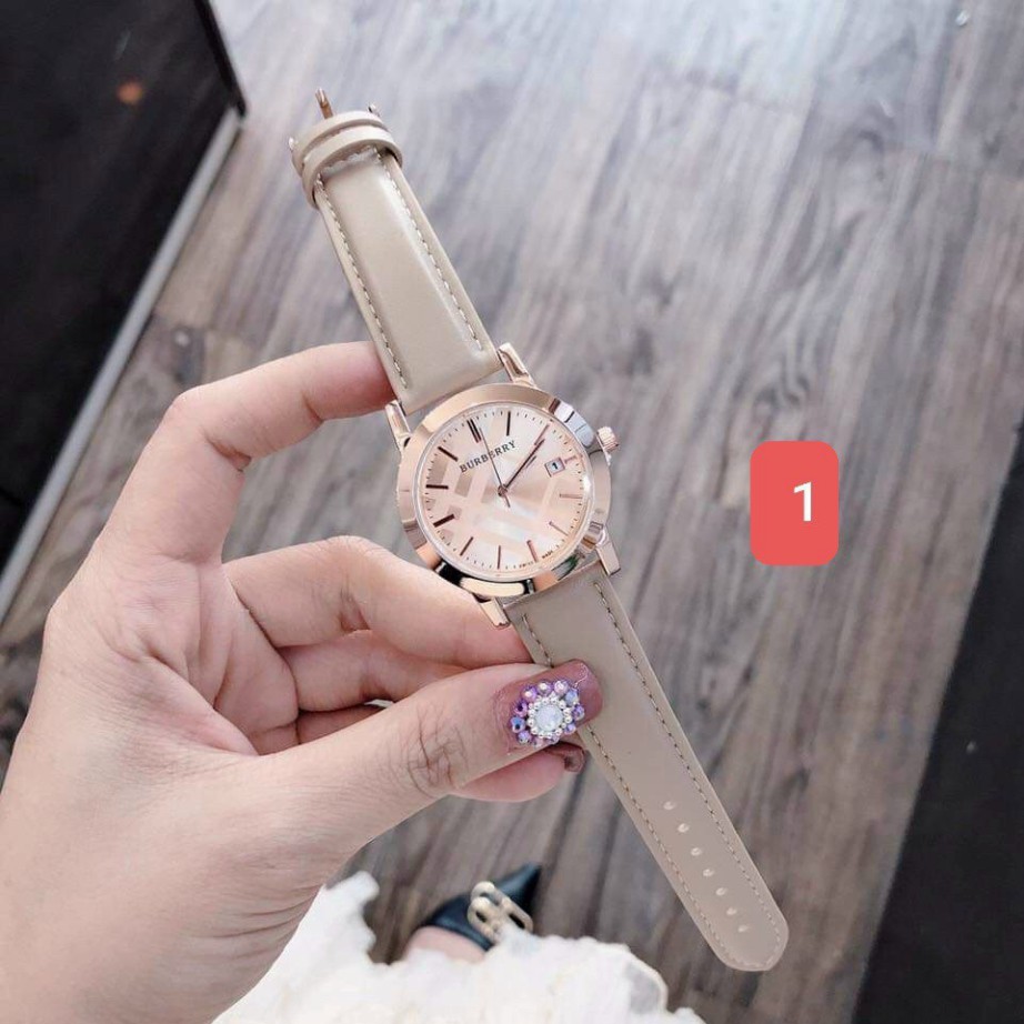 Đồng hồ dây da nữ Burberry mặt hồng, bảo hành 12 tháng, có box