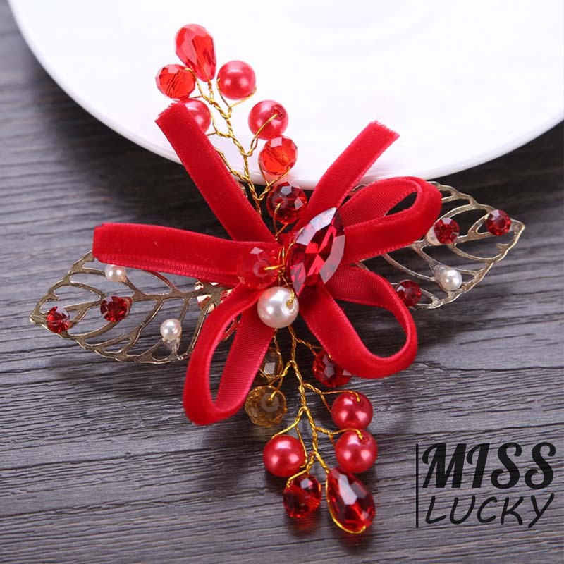 Kẹp tóc đính lá và ngọc giả xinh xắn dành cho nữ