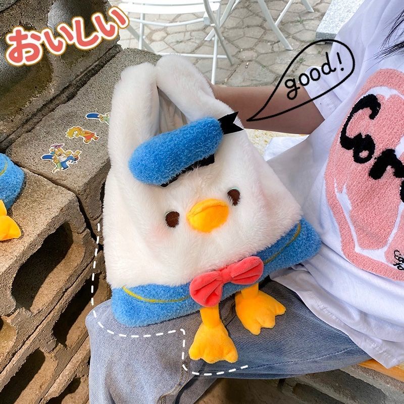 Túi xách hình chú vịt Donald mềm mại ấm áp dành cho bạn nữ