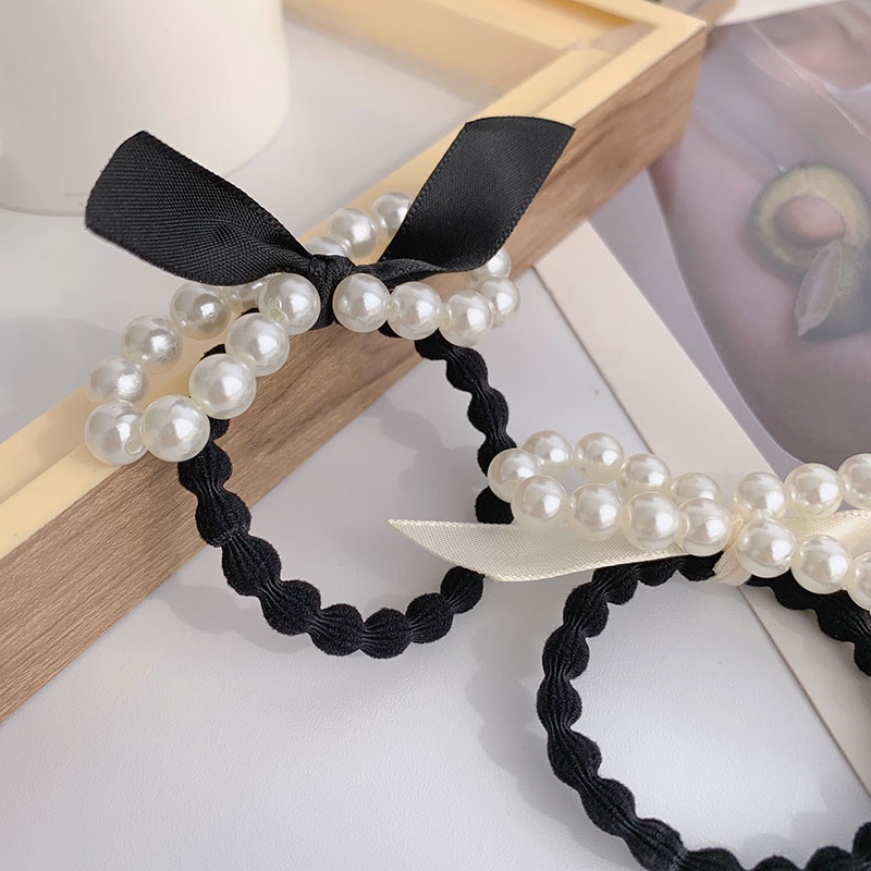 Dây buộc tóc đuôi ngựa thắt nơ đính ngọc trai phong cách Hàn Quốc đơn giản thời trang cho nữ