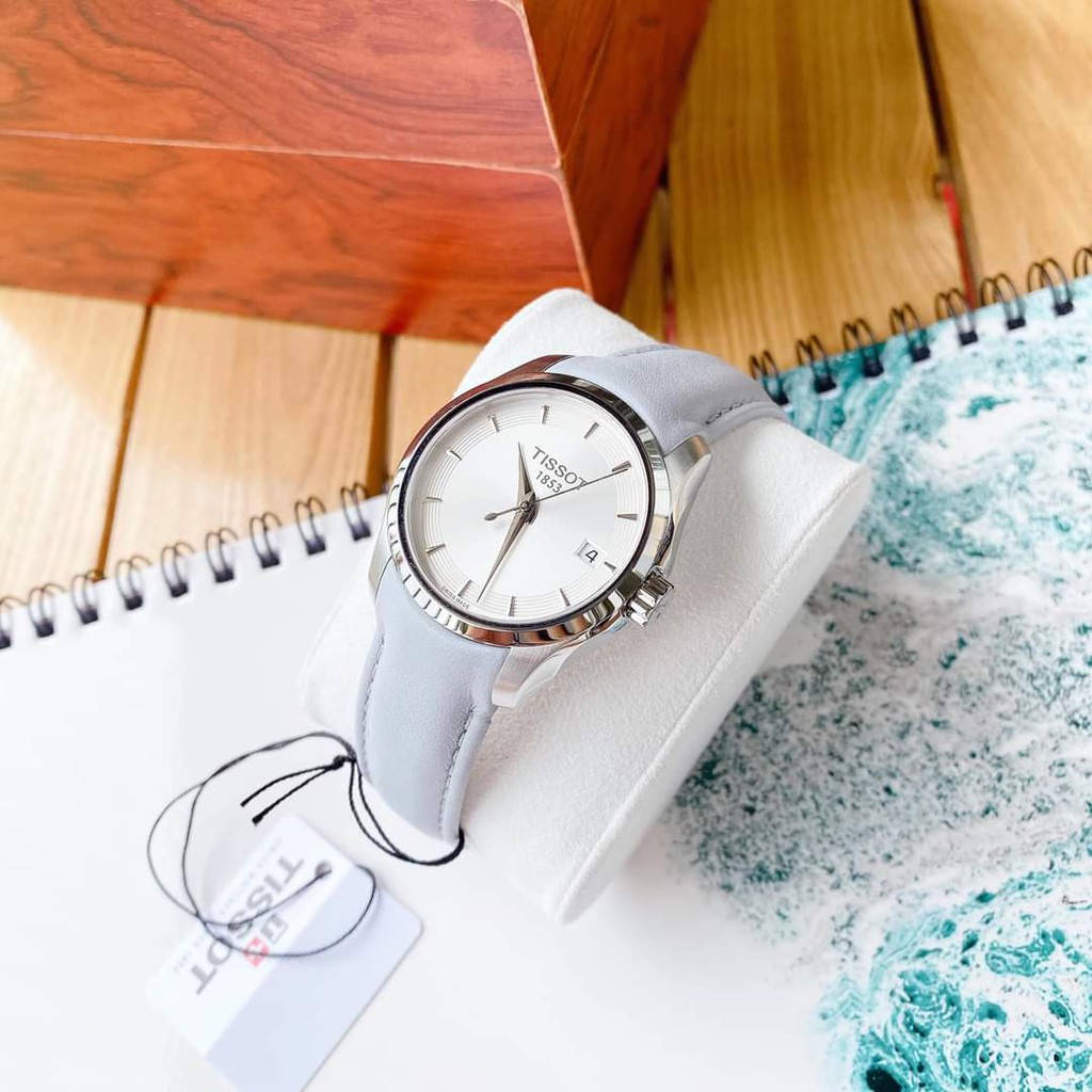 Đồng hồ Nữ chính hãng Tissot 1853 Couturier T035.210.16.031.02 Size 32,Mặt trắng,Lịch ngày-Máy Pin Quartz-Dây da xanh