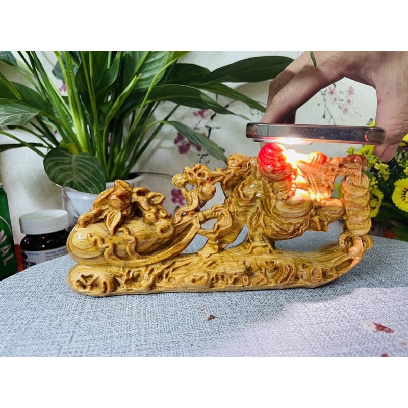 tượng di lặc kéo bao gỗ huyết long