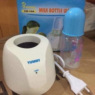 Máy hâm sữa tặng kèm bình sữa