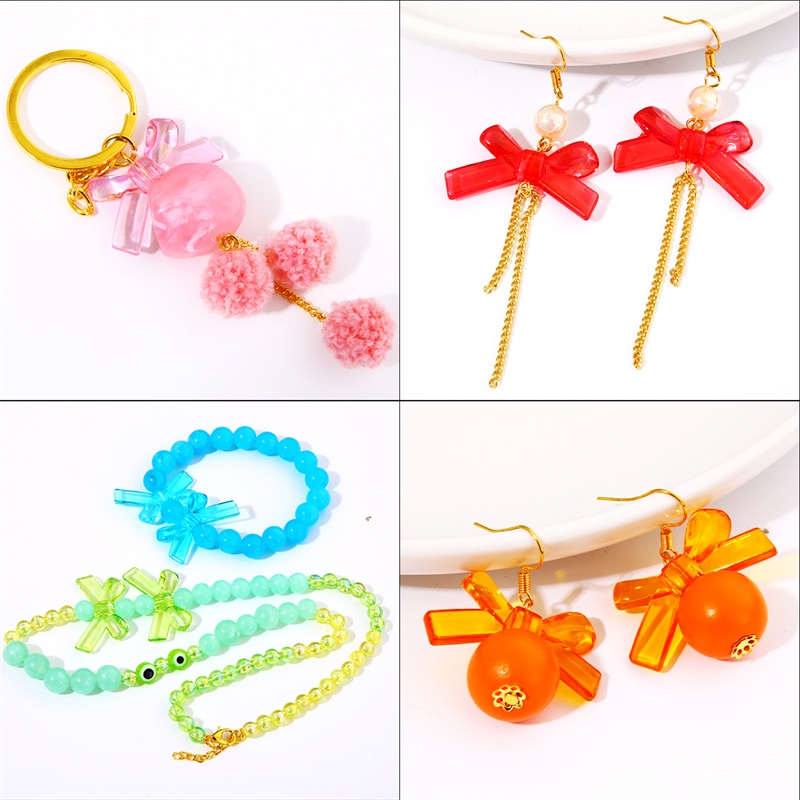 Set 4 hạt acrylic trong suốt hình nơ 34x20mm dùng làm trang sức thủ công