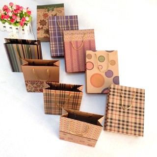 TÚI GIẤY ĐỰNG QUÀ KRAFT, TÚI QUÀ XI MĂNG CÓ QUAI IN HOẠ TIẾT (GIAO MẪU NGẪU NHIÊN)