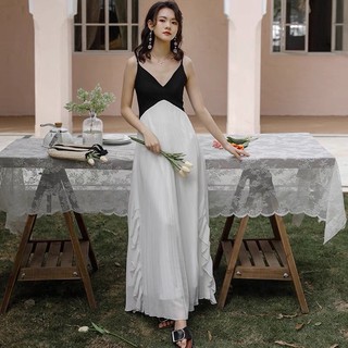 Váy maxi xếp ly phối màu đen trắng