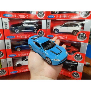 Xe Mô Hình Aston Martin V12 Vantage 1:34 Welly ( Xanh BaBy )