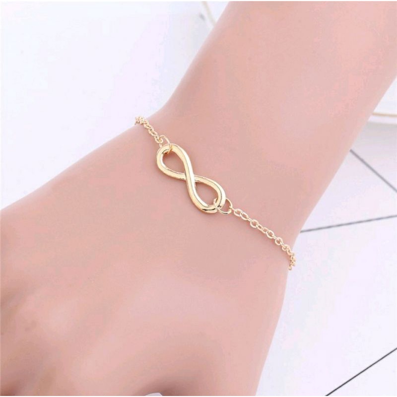 Lắc tay vô cực cho nữ 2 màu vàng và bạc kiểu dáng thời trang