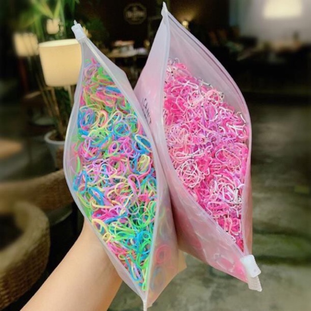 Combo 2 túi  chun buộc tóc cho bé kèm túi zip đựng