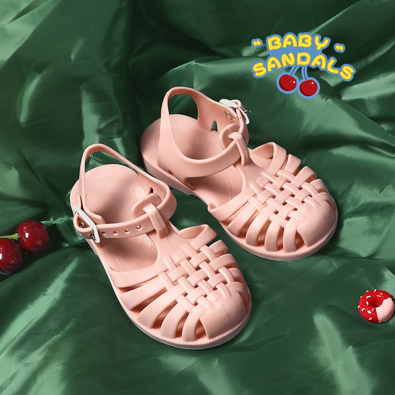 Giày sandal đế phẳng mặt rỗng có khóa gài màu trơn thời trang mùa hè dành cho bé trai và bé gái