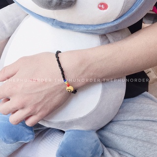 Vòng hạt đen mix icon mặt cười