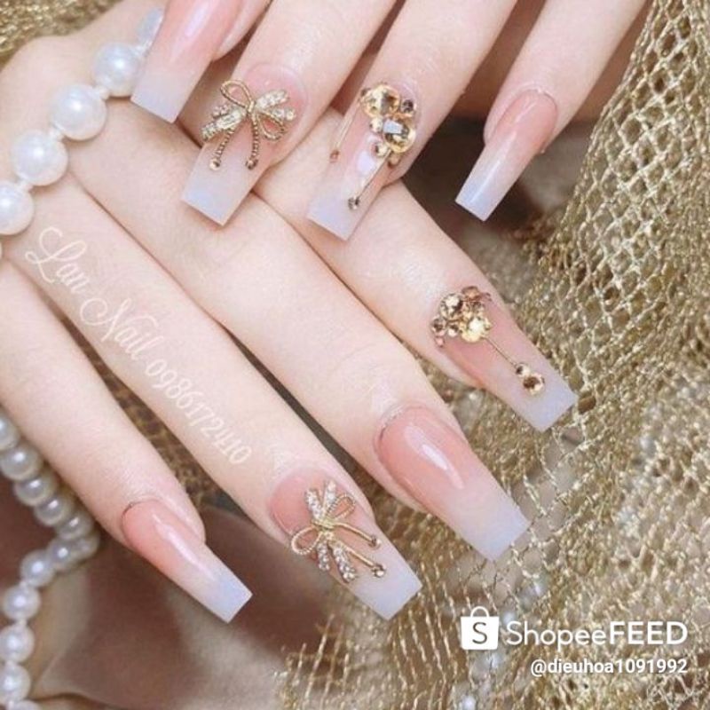 Bộ móng úp tay gắn charm nơ kim loại sơn nền màu thạch hàng đặt làm theo số đo móng thật của khách