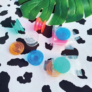 Giá đỡ điện thoại màu sắc trong suốt dính chặt tiện dụng