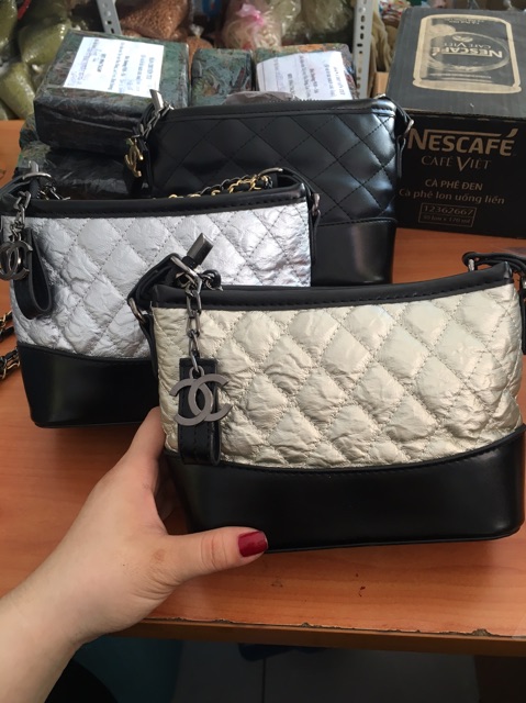 Túi đeo pha màu,da dập