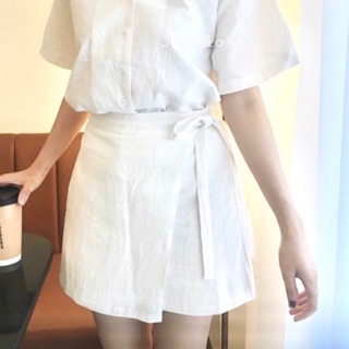 Chân váy buộc nơ vạt lệch