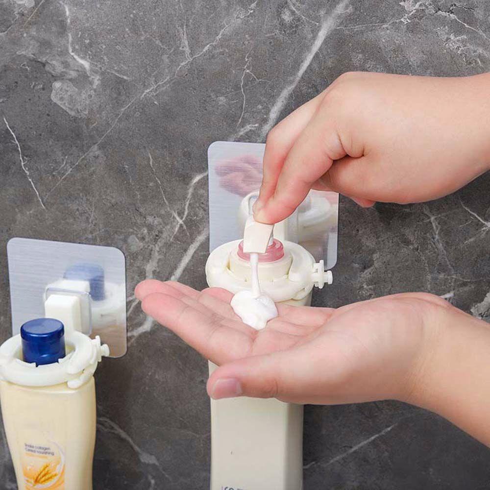 Giá Đỡ Chai Dầu Gội Gắn Tường Tự Dính Tiện Dụng