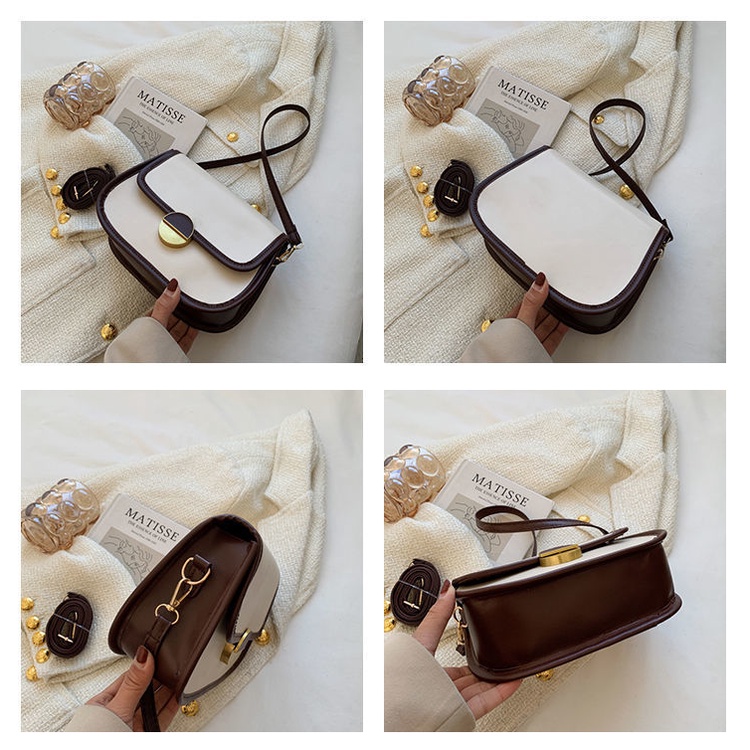 Túi xách nữ đeo chéo khóa tròn kiểu dáng yên ngựa thanh lịch có hai màu trắng và đen