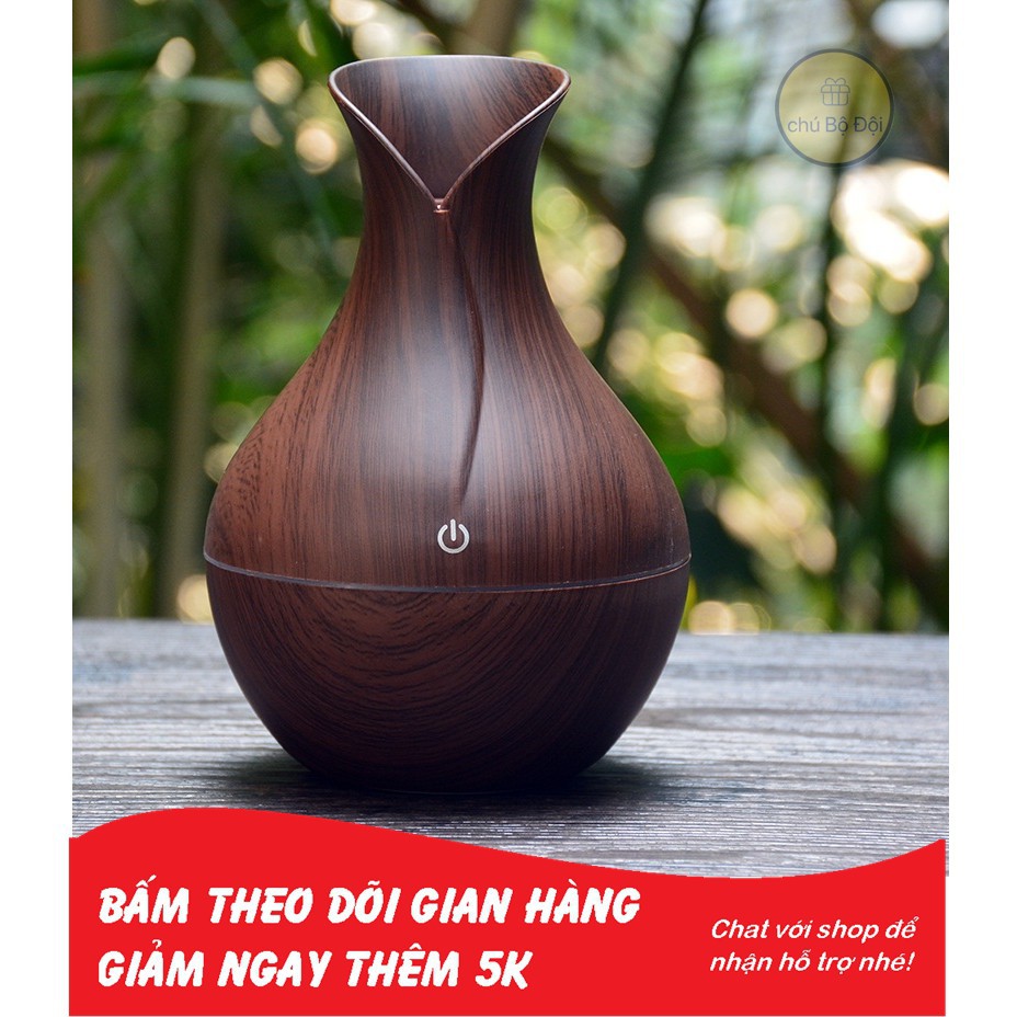 Máy xông tinh dầu,Máy phun sương vân gỗ đen búp sen, tặng kèm 1 chai tinh dầu cao cấp.