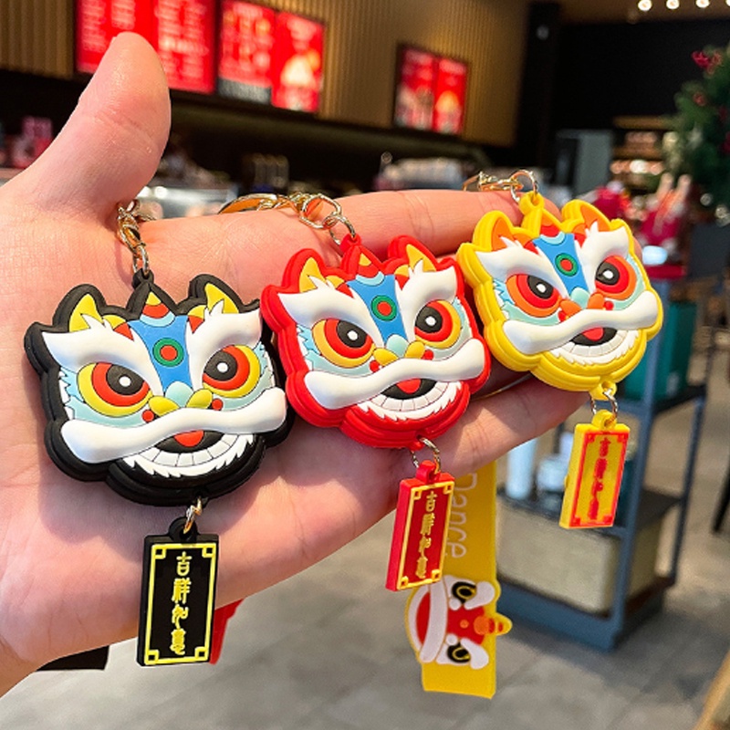 Móc khóa nhựa dẻo hình đầu Lân cá tính