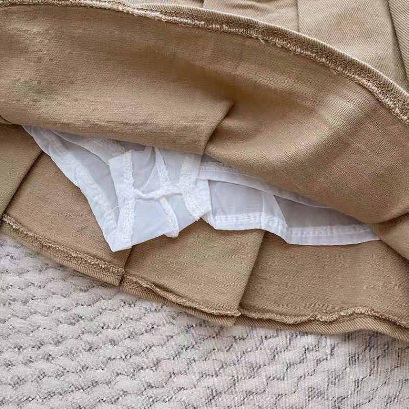 Chân váy thô xếp li kèm thắt lưng dáng xoè có quần bảo hộ