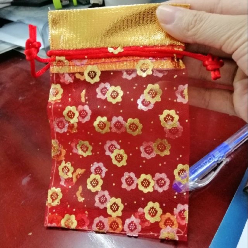 100 chiếc túi lộc đỏ kèm zip đựng gạo muối đầu năm.