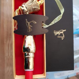 SON CHRISTIAN LOUBOUTIN