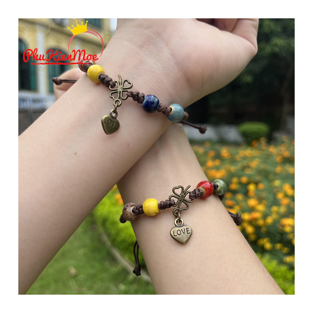 Vòng tay dây rút hạt thổ cẩm hình chiếc lá may mắn gắn tim handmade PhuKienMoe