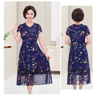 Đầm CỔ BÈO HOẠ TIẾT CÁC HÀNH TINH  trung niên cho các mẹ và dì sang đẹp có bảng kích thước và ảnh thật