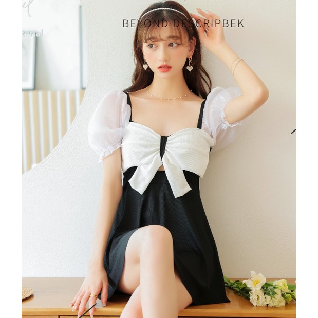 Bộ đồ bơi nữ liền thân dáng váy nơ xinh tay phối voan trắng