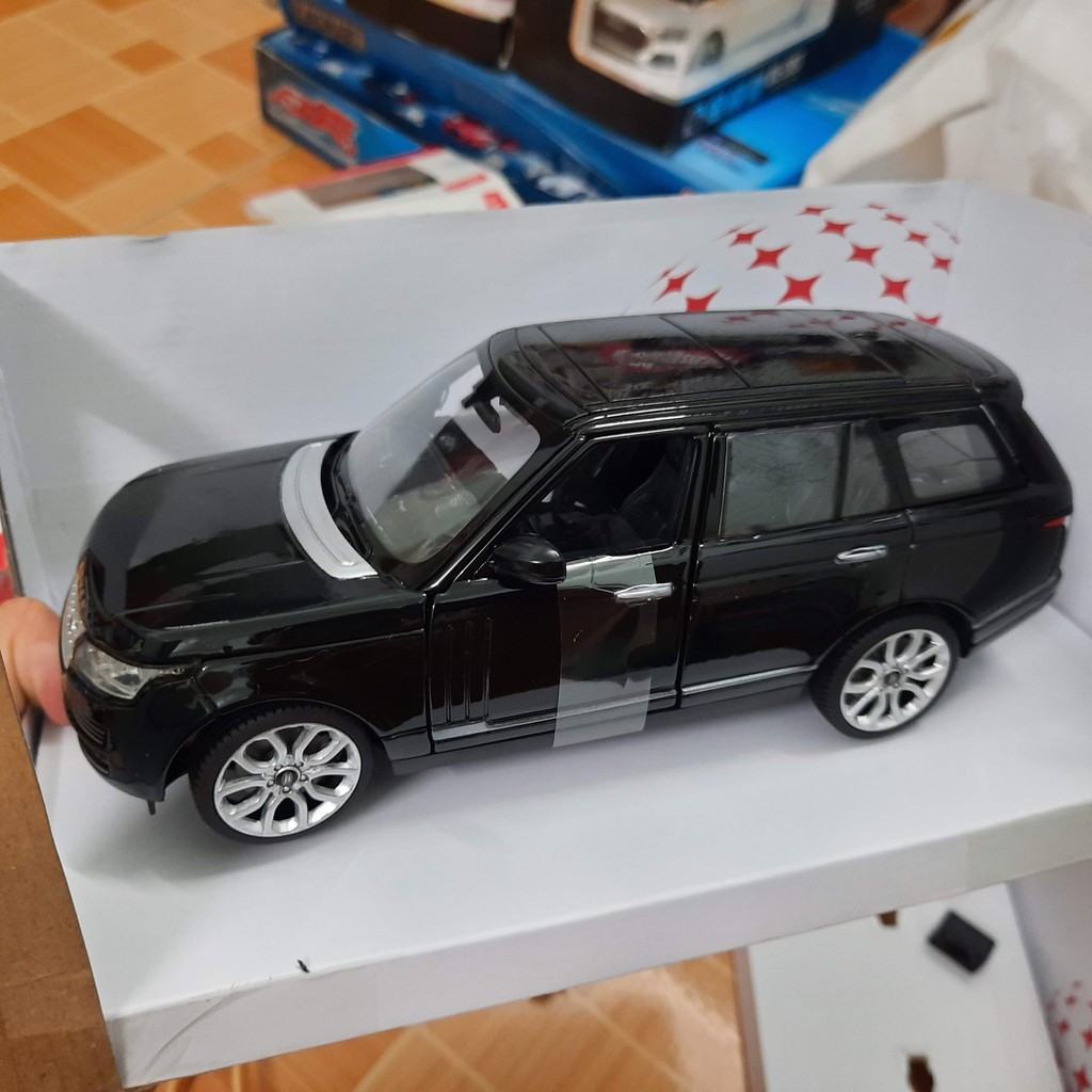 Xe ô tô mô hình Range Rover tỉ lệ 1:24 xe ô tô mô hình bằng sắt đồ chơi trẻ em có vô lăng bẻ lái và mở 2 cửa trước