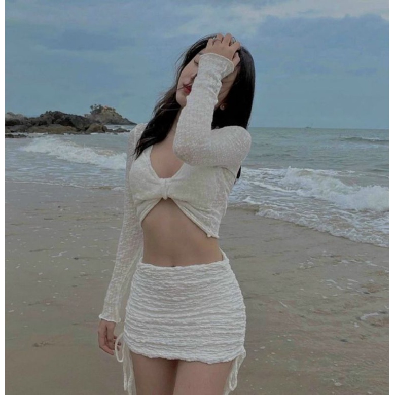 Set 3 món: Áo bra bikini cột dây cổ yếm + Khoác crop nơ ngực tay dài + Chân váy body nhún thân rút dây trắng (Dài/Ngắn)