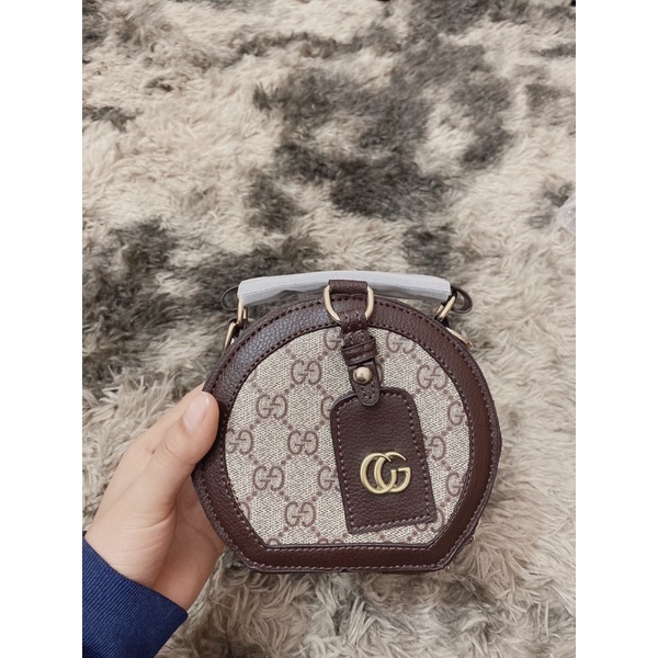 Guc ci hộp tròn NÂU TÂY