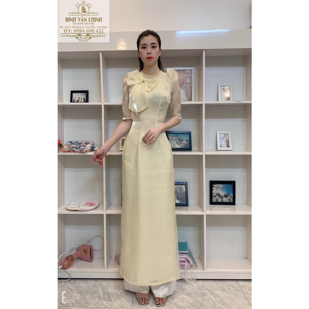 Áo dài tơ sống nơ ngực điểm trai full cổ màu da sáng