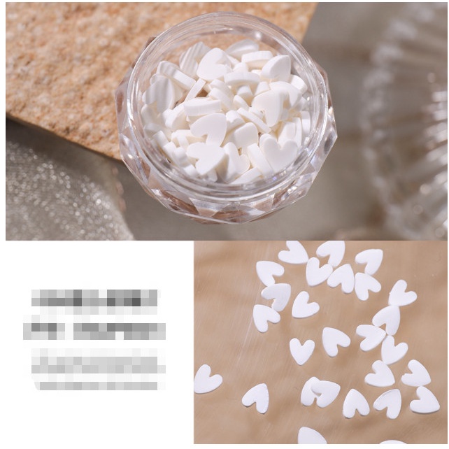 charm tim trang tri nail