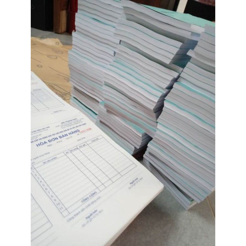 Hóa đơn bán hàng 2 liên khổ A5 in theo yêu cầu giá 19.000₫/q áp dụng cho sl trên 100 quyển