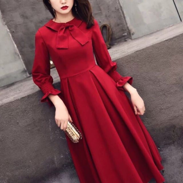 Đầm xòe cột nơ tay dài bèo chạy thun