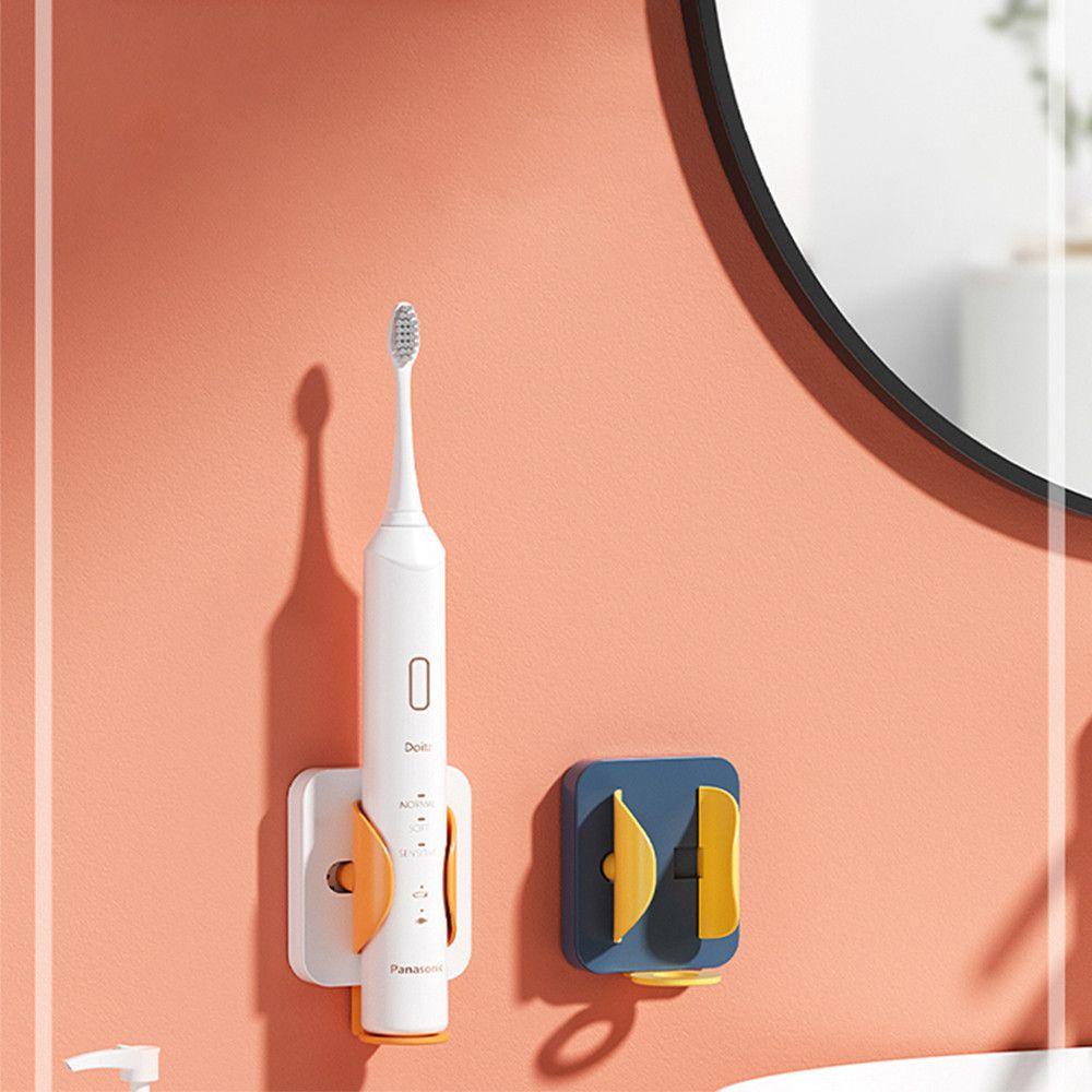 Giá Đỡ Bàn Chải Đánh Răng Điện Tự Dính Thời Trang