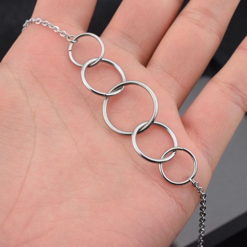 Dây chuyền làm bằng thép Titanium mặt hình nhẫn dành cho nam nữ