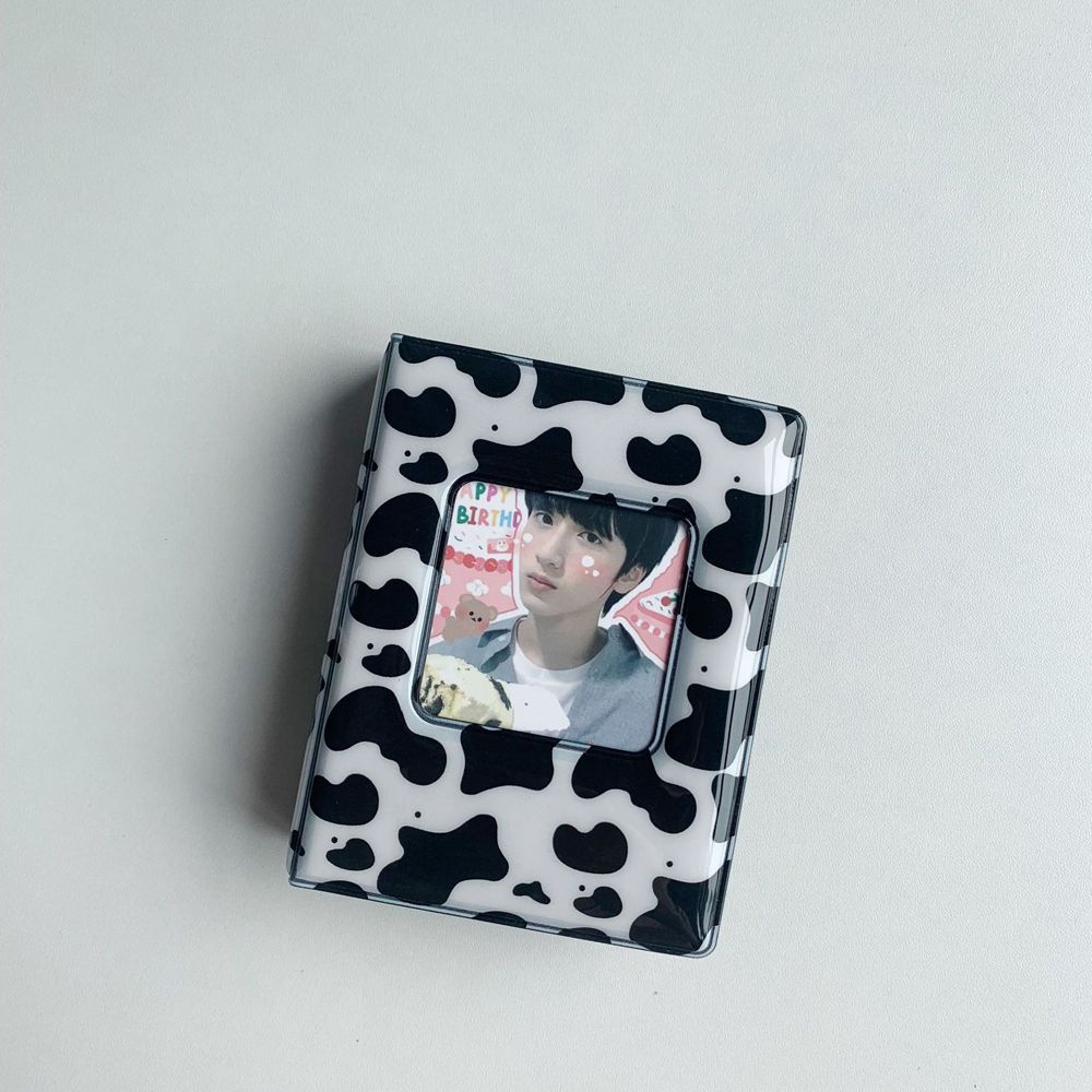 Album đựng ảnh mini gồm 16 trang thiết kế bìa họa tiết bò sữa kích cỡ 8.5×11×2.6cm