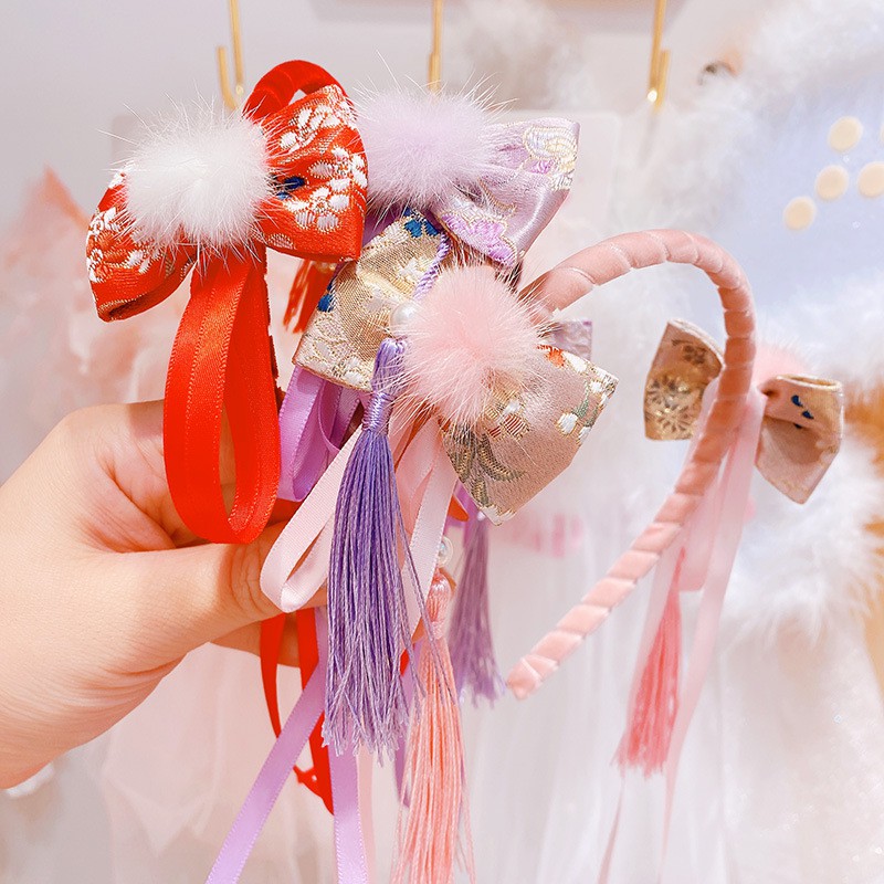 Băng đô phối nơ đáng yêu dành cho bé gái