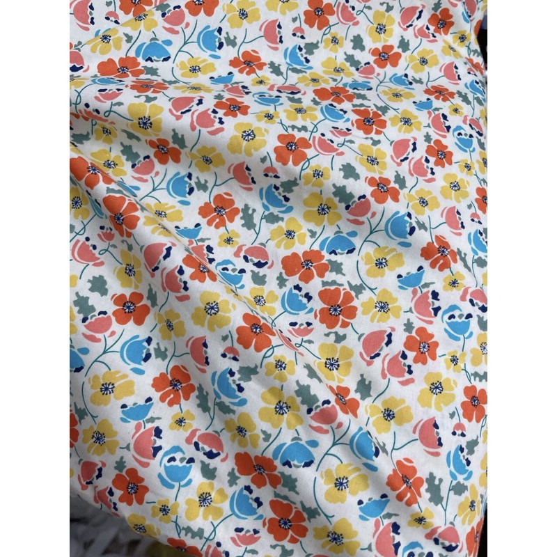 Vải thô cotton hoa cam vàng